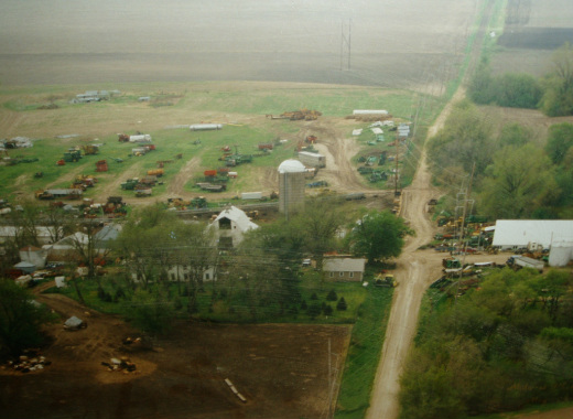 Aerial view of the Mid Iowa Equipment farm and machinery lot in Newton, Iowa